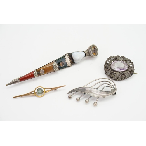 196 - A Luckenbooth style sword brooch along with three others in 9ct Gold.