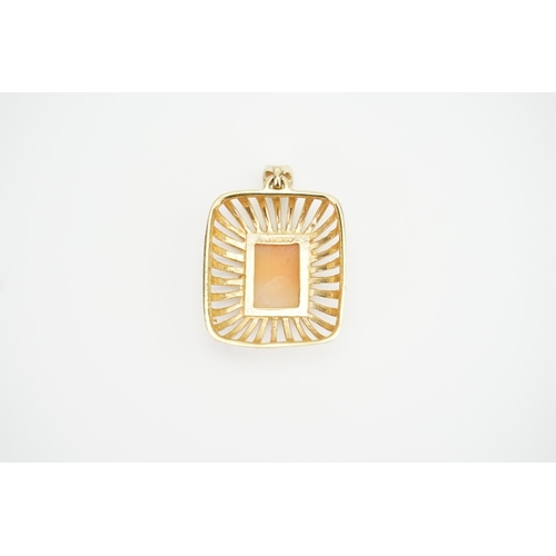 154 - A 9ct Gold Cameo pendant depicting a girl looking to her left. Size 2.1cms x 2.4cms.