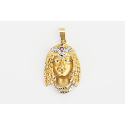 159 - An 18ct Gold Cleopatra pendant set with paste stones. Weight approx. 14.3g. Size 3.6cm x 2.5cm.