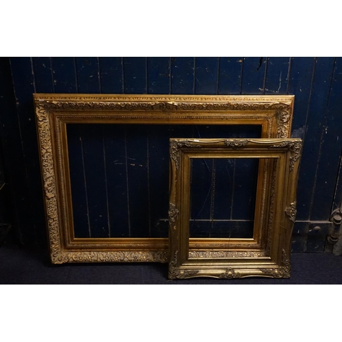 1037 - Two Large Gilt Picture Frames. 92cms x 63cms. 41cms x 53cms. along with two smaller Gilt Frames & tw... 