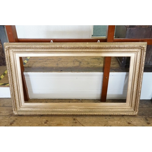 1038 - AN Antique Large Gold Gilt Frame. Measuring: 150cms x 85cms.