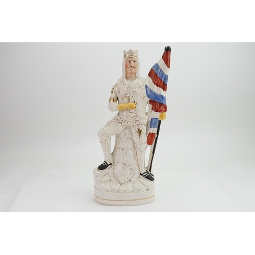 961 - A Victorian Staffordshire Flat Back Figure of a Crowned King holding a Flag, possibly Henry V.