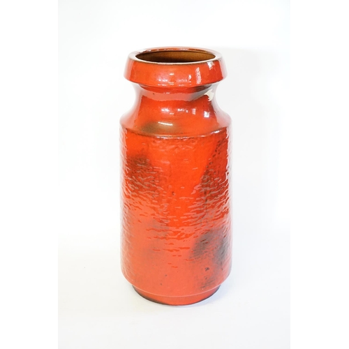 962 - A 1960s Red Glazed German Vase. Measuring: 47cms High.