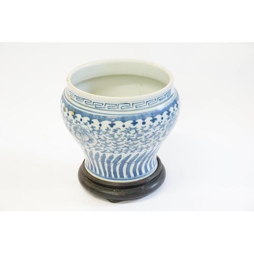 388 - A Chinese Blue and White Lotus pattern Jardinière. Measuring: 17.5cms high x 21.5cms across.