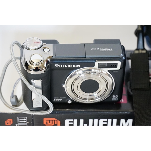 342 - A Fujifilm Fine Pix Camera in case with charger & accessories.