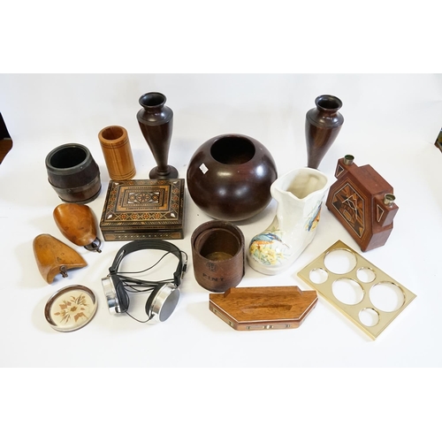 535 - A Treen carved bowl, a marquetry inlaid candlestick, Art Deco jug, wooden vases, etc.