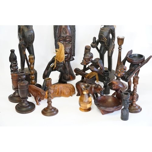 536 - A Collection of African Fetish Wood Figures, Face Masks,  Turned Candlesticks, Animal ornaments and ... 