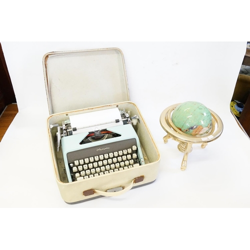 541 - A Semi precious mounted globe along with a Typewriter.