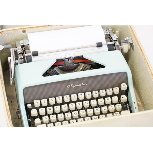 541 - A Semi precious mounted globe along with a Typewriter.