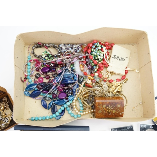 221 - A Large Collection of Costume Jewellery to include coins, pens, necklaces, etc.