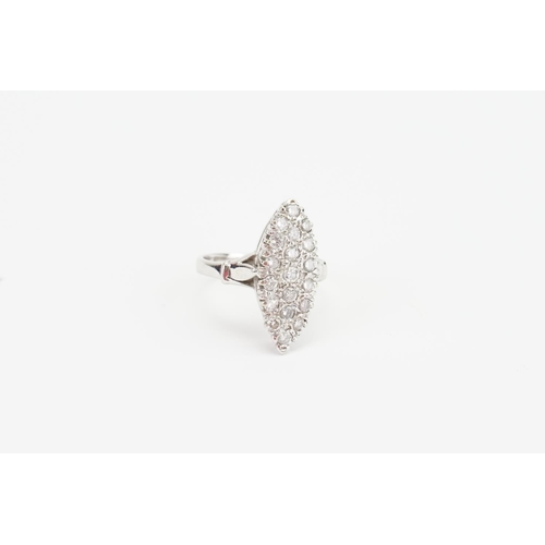 69 - An 18ct white Gold Marquise shaped Diamond Ring mounted with 19 diamonds. Total carat 0.9ct. Diamond... 