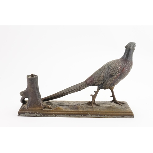 250 - An Art Deco painted spelter table lighter designed as a pheasant.