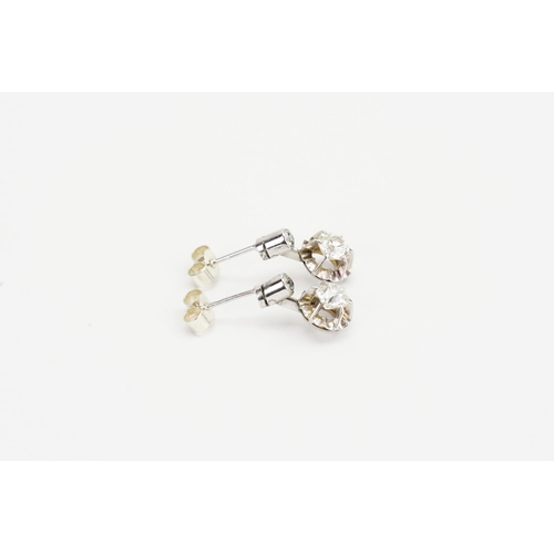 63 - A Pair of White metal Diamond Drop Earrings, Largest Diamond size approx: 0.5ct and Smallest approx:... 