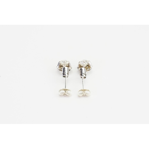 63 - A Pair of White metal Diamond Drop Earrings, Largest Diamond size approx: 0.5ct and Smallest approx:... 