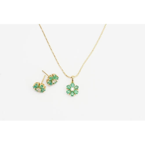 197 - A Pair of 18ct Floral Earrings set with Emeralds and Diamonds along with a matching 18ct Pendant. 18... 