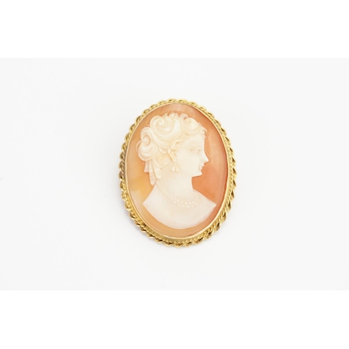 91 - A 9ct Gold Cameo Brooch depicting a Young Lady. Size approx: 2.7cms x 3.4cms. Weight approx: 6.2 gra... 