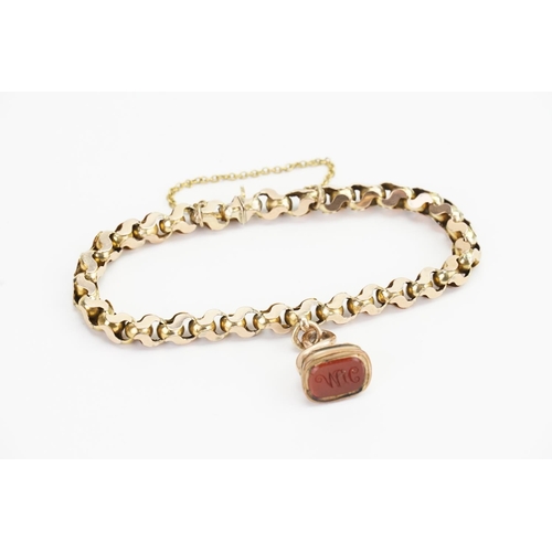 89 - A 9ct Gold Ball and Link Bracelet mounted with a Wax Seal (HM). Weight approx: 12.4 grams.