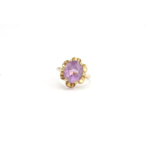 70 - A 9ct Gold Large Oval Amethyst set Ring. Size: 10.2mm x 12mm.. Weight: 3.4 grams. Size P.