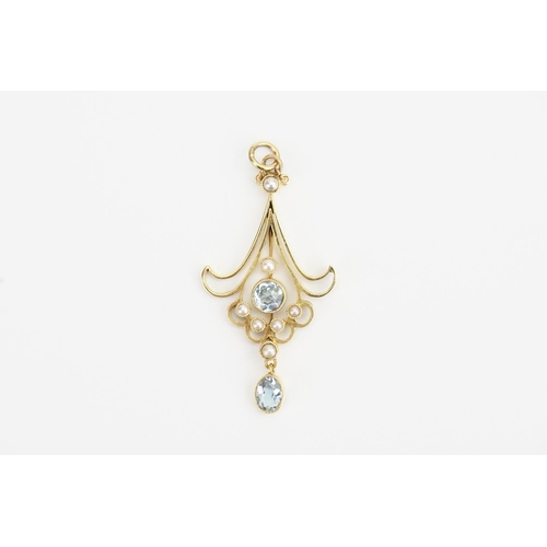 79 - A 15ct Gold Aquamarine and Pearl set Pendant. Aquamarine: 0.33ct largest. Size: 4cms long.