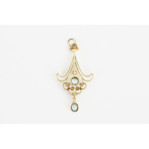 79 - A 15ct Gold Aquamarine and Pearl set Pendant. Aquamarine: 0.33ct largest. Size: 4cms long.