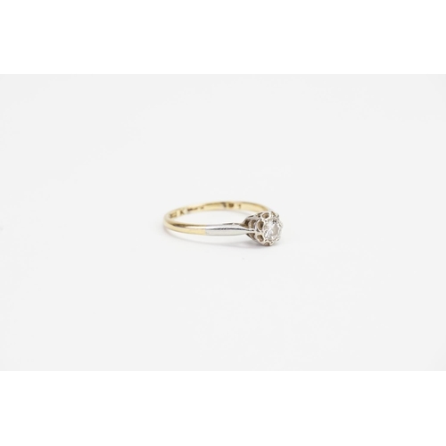 64 - An 18ct Gold and Platinum set Diamond Ring, Illusion set, 0.20ct Diamond size. Ring size: o.