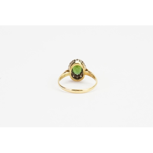 154 - A 9ct Gold Tourmaline (1ct) and Diamond Ring. Size Q.