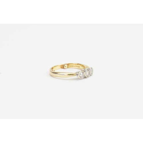 176 - A 18ct Gold Three Stone Diamond set Ring, largest Diamond 0.2ct and the smaller 0.15ct. Ring size: M... 