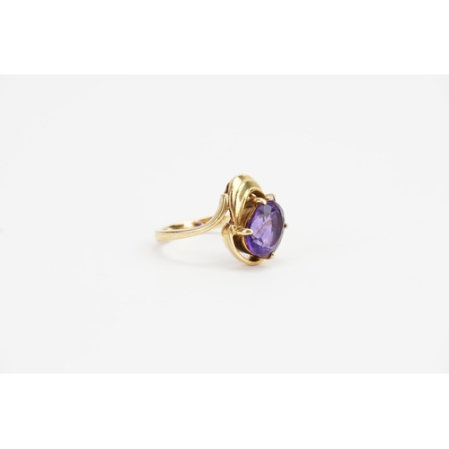 157 - A 14ct Gold Amethyst (2ct) and Diamond set Ring. Ring Size: O. Weighing: 5.4 grams.