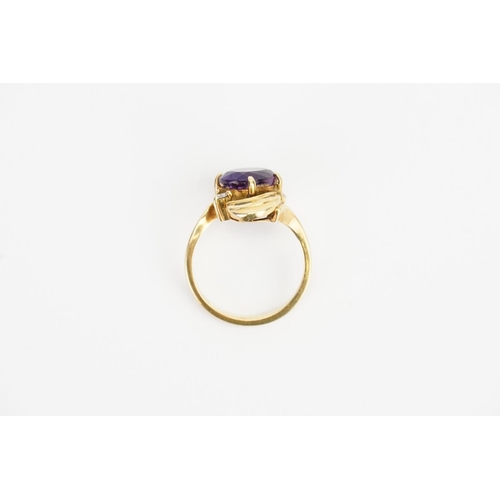 157 - A 14ct Gold Amethyst (2ct) and Diamond set Ring. Ring Size: O. Weighing: 5.4 grams.