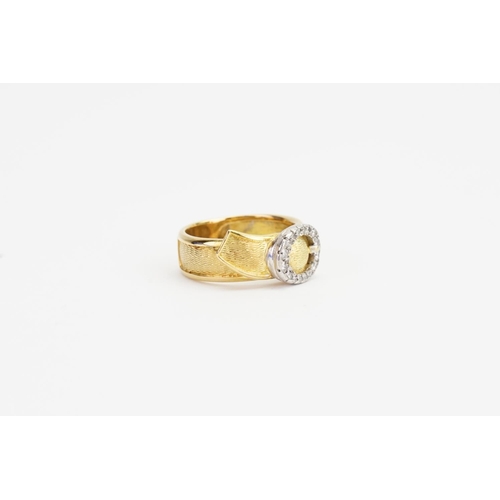 94 - An 18ct Gold Diamond set Buckle Ring set with 16 Diamonds. Size N. Weighing: 7.7 grams.