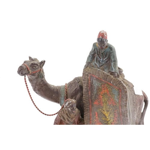 256 - A Spelter Table Lighter designed as a Camel with Attendants.