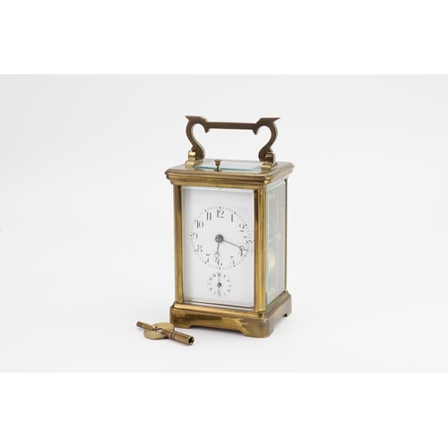 223 - A Brass Four Plate French Design Carriage Clock with alarm & Chiming Movement with a White enamelled... 