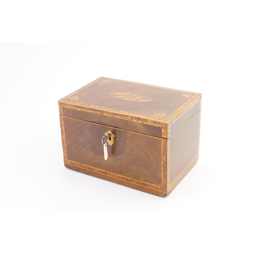 279 - A Georgian Mahogany & inlaid Shell decorated Tea Caddy.