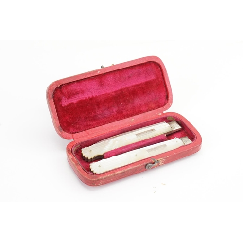 257 - A Silver Regency Mother of Pearl Travelling Folding Knife & Fork in a Moroccan Case. Hallmarked.