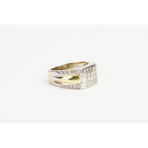 83 - An 18ct Gold Diamond set Ring, set with 36 Diamonds, mounted with Diamond Shoulders. Weight: 13.8 gr... 