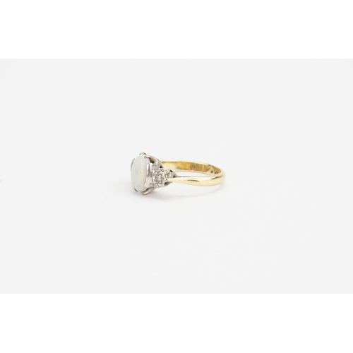 84 - A 18ct Gold & Platinum set Diamond and Opal Ring. Diamond size: 0.05ct each. Opal size: 1ct. Ring Si... 