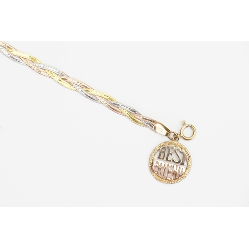 97 - An Italian 14ct marked Tri-Gold Bracelet, Hung with a Charm. Weight: 4.4 grams.