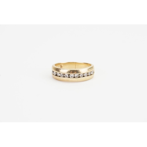 86 - A 14ct Gold Half Eternity Diamond Ring, set with 11 Diamonds. Diamond size: 0.035ct. Ring size: R. W... 