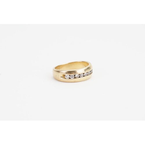 86 - A 14ct Gold Half Eternity Diamond Ring, set with 11 Diamonds. Diamond size: 0.035ct. Ring size: R. W... 