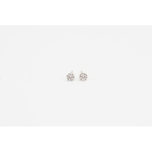 96 - A 9ct White Gold Pair of illusion set Diamond Earrings. Diamond size approx: 0.075ct. Weight: 0.9 gr... 