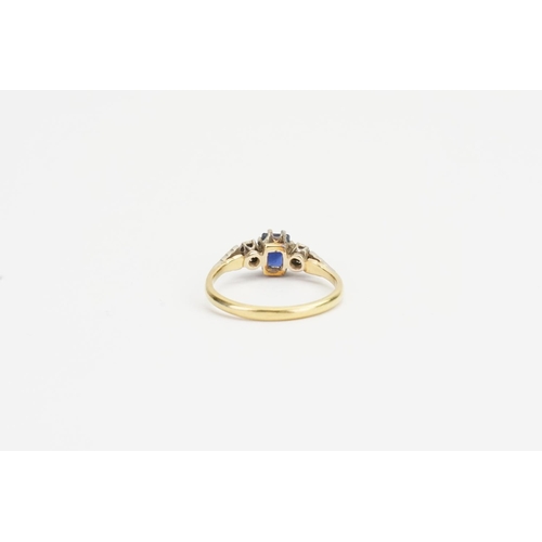 166 - A 18ct Gold & Platinum Sapphire and Diamond Ring. Sapphire size: 0.11ct. Ring size: N. Weight: 2.5 g... 