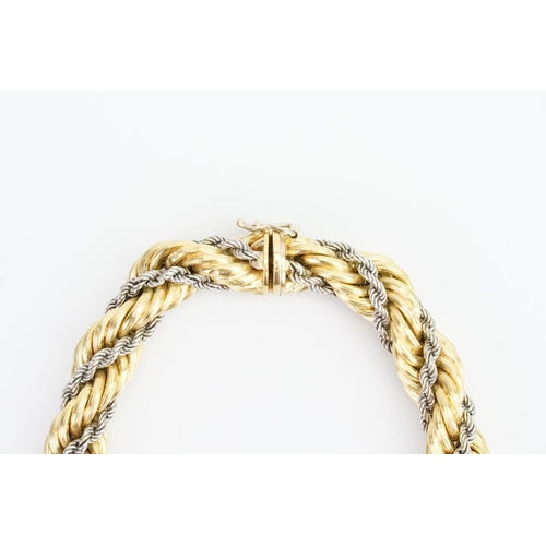 135 - A Lovely 18ct Yellow & White Gold graduated Rope Chain. Length: 45.8cms. Width 9mm-13mm. Yellow Box ... 