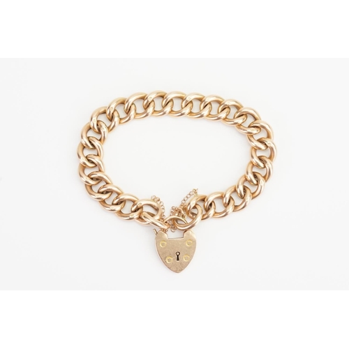 105 - A 15ct Gold (marked) Padlock Bracelet hung with a Love Heart Locket. Weight: 27.1 grams.