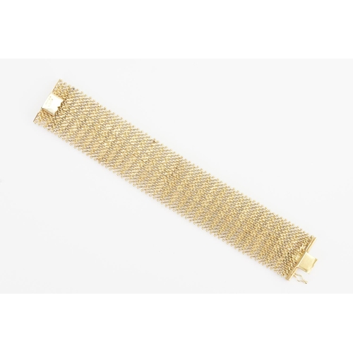 118 - A 18ct Gold Mesh design Bracelet. Weight: 60 grams. Length 17.5cms. Width: 3cms.