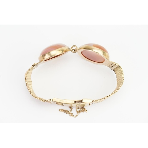 134 - An interesting 9ct Gold Bracelet set with Two Large Oval Stones. Weight: 38.4 grams. (Each Stone: 3c... 