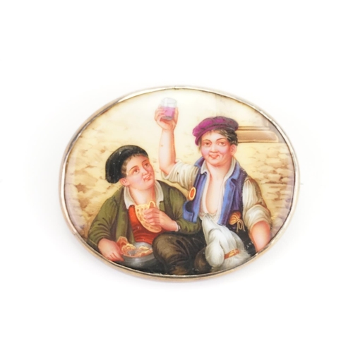 128 - An Italian painted on Porcelain & Silver mounted Brooch depicting two Ragamuffins eating there food ... 