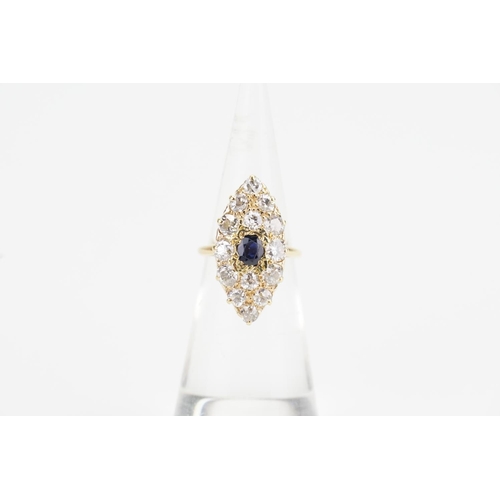 113 - A Marquise design Diamond and Sapphire set Ring. Size G. Weight: 3.6 grams. Largest Diamond 0.15ct. ... 