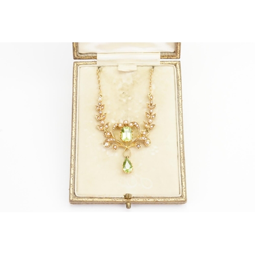 192 - A Victorian 15ct Gold Peridot and Pearl Necklace set with Two Peridots, one Emerald cut and the othe... 