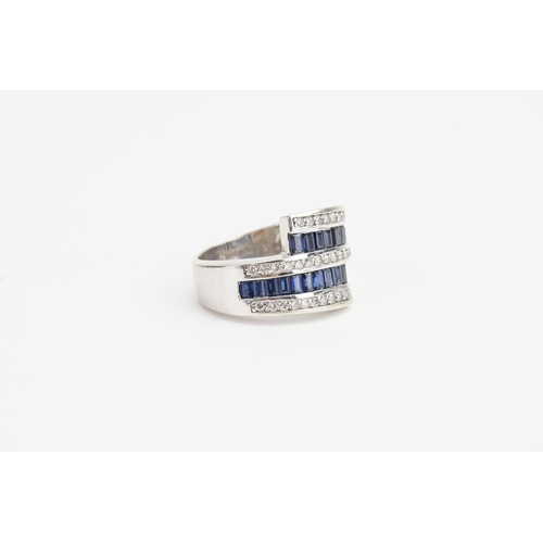 139 - A 14ct White Gold Diamond and Sapphire Ring, set with 20 Sapphires (Largest 0.05ct). Size R. Weight ... 