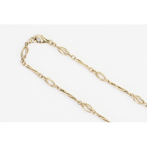 110 - A 9ct Gold Twist and Ball Chain. Length 63cms. Weight: 14 grams.